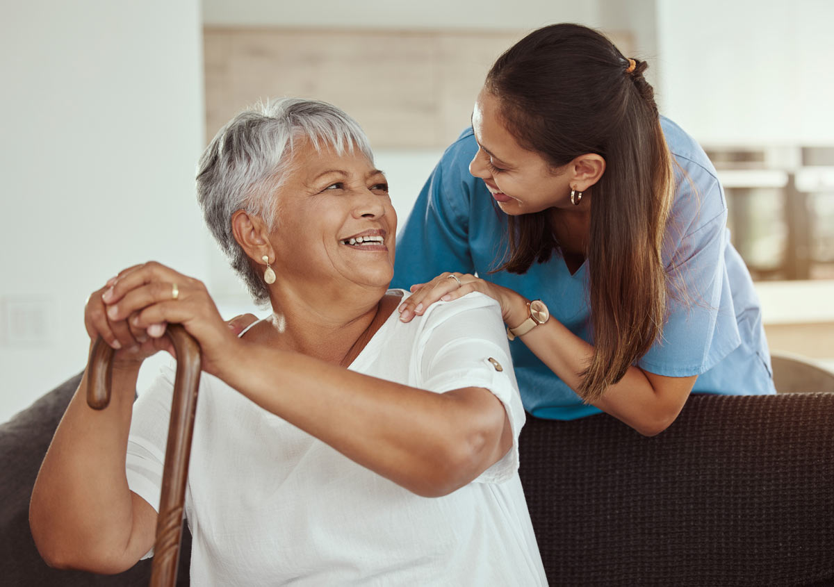 Caregiver with arms around client
